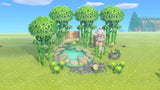 Animal Crossing Mini Bamboo Spring Garden with a glowing moss pond ringed by rocks, bamboo trees, a tall stone lantern and a deer scare water basin