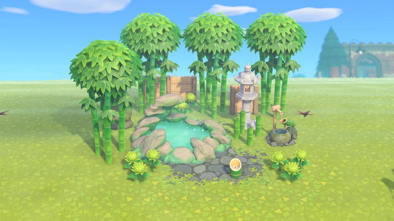 Animal Crossing Mini Bamboo Spring Garden with a glowing moss pond ringed by rocks, bamboo trees, a tall stone lantern and a deer scare water basin